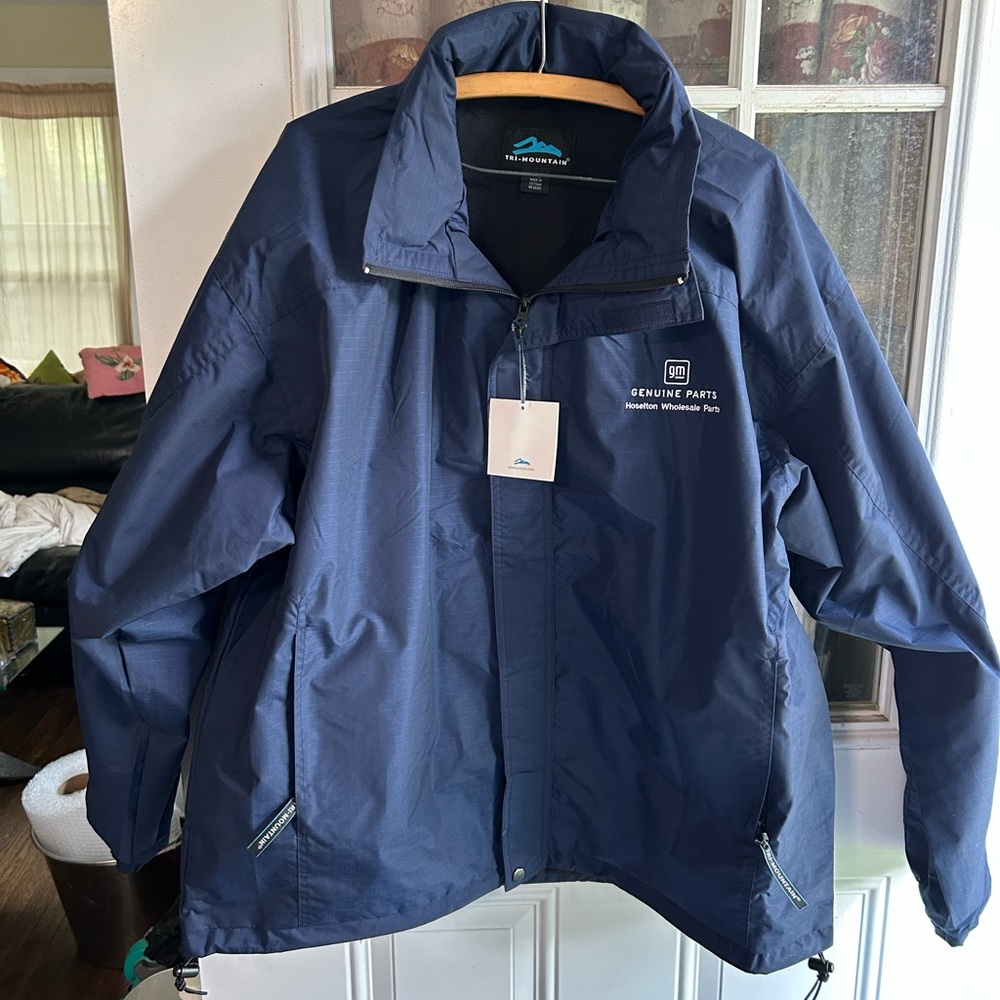 NWT Tri mountain men’s 2X navy blue rain jacket three zip packets zip closure